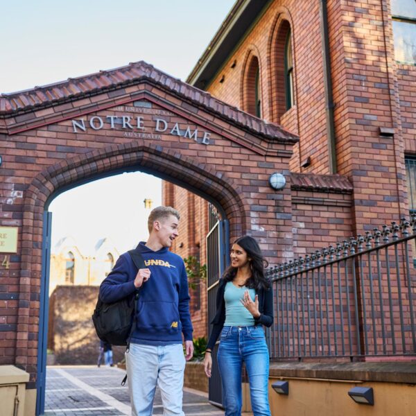 Two students walking on campus at Notre Dame