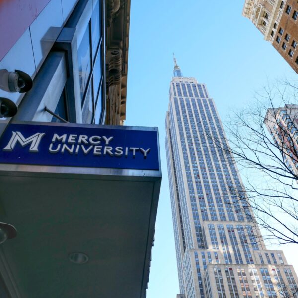 Mercy University sign in front of Empire State Building