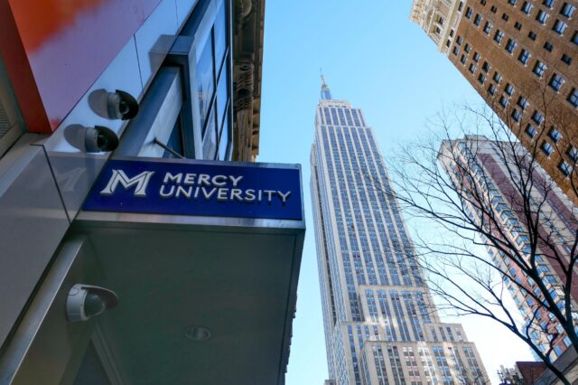 Mercy University sign in front of Empire State Building