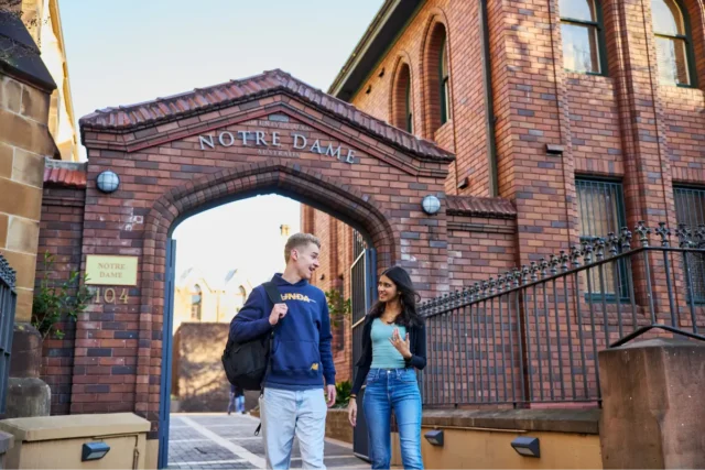 UNDA Students on campus entrance