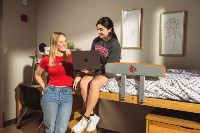 Two students talking in accommodation