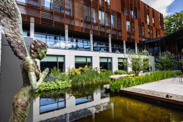 University of Winchester modern building with water feature