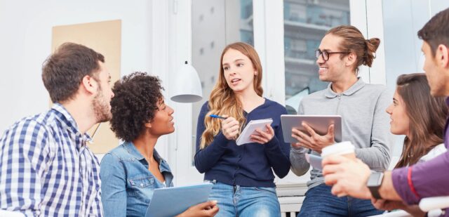 Humanities students talking in a group