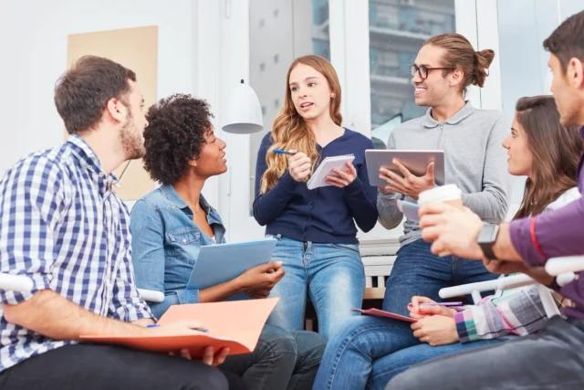 Humanities students talking in a group