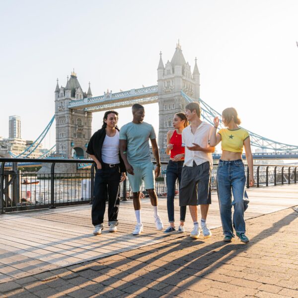 Group of students stood in front of Tower Bridge on the southbank