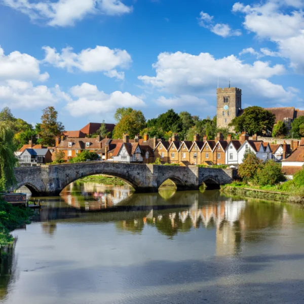 View across a river of a small town in Kent, England
