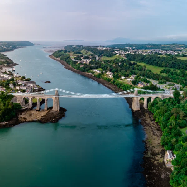 Aerial view of Telford's Suspension Bridge Across The Menai Straights - Wales, UK.