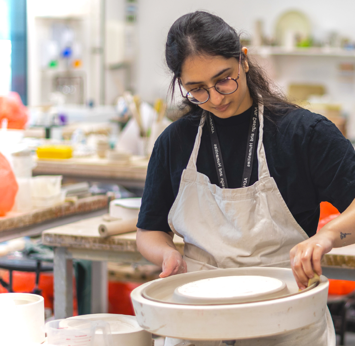 Student making pottery